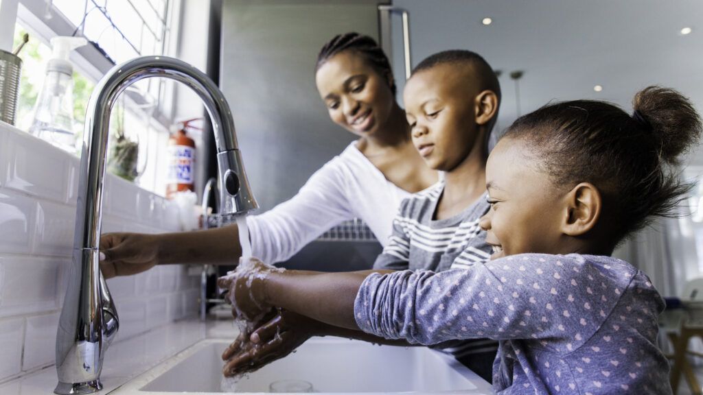 Family washing their hands