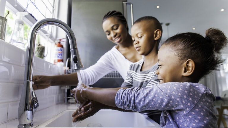 Family washing their hands