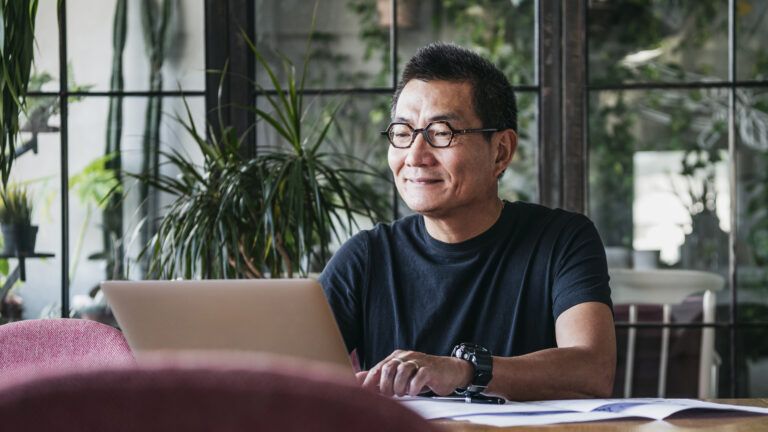 A man working from home on his laptop.