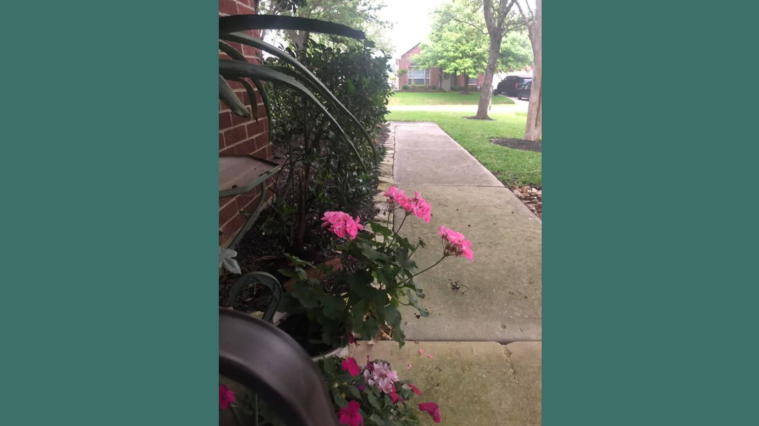 Sitting outside in the evening and watching people coming home from work or play.