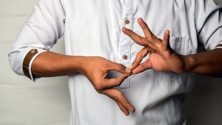 A man's hands sign 'appreciation'