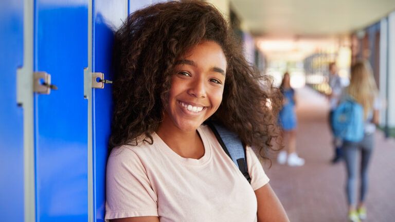 A young woman smiles