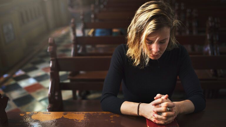 A woman prays