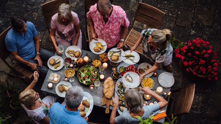 Friends dining outdoors together