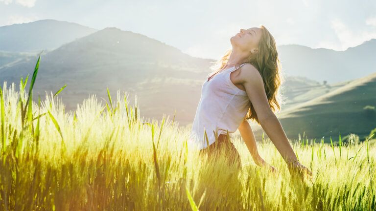 A woman basks in sunshine