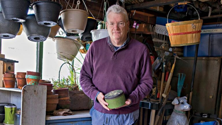 Mike Frezon with his vintage tin; photo by Roy Gumpel