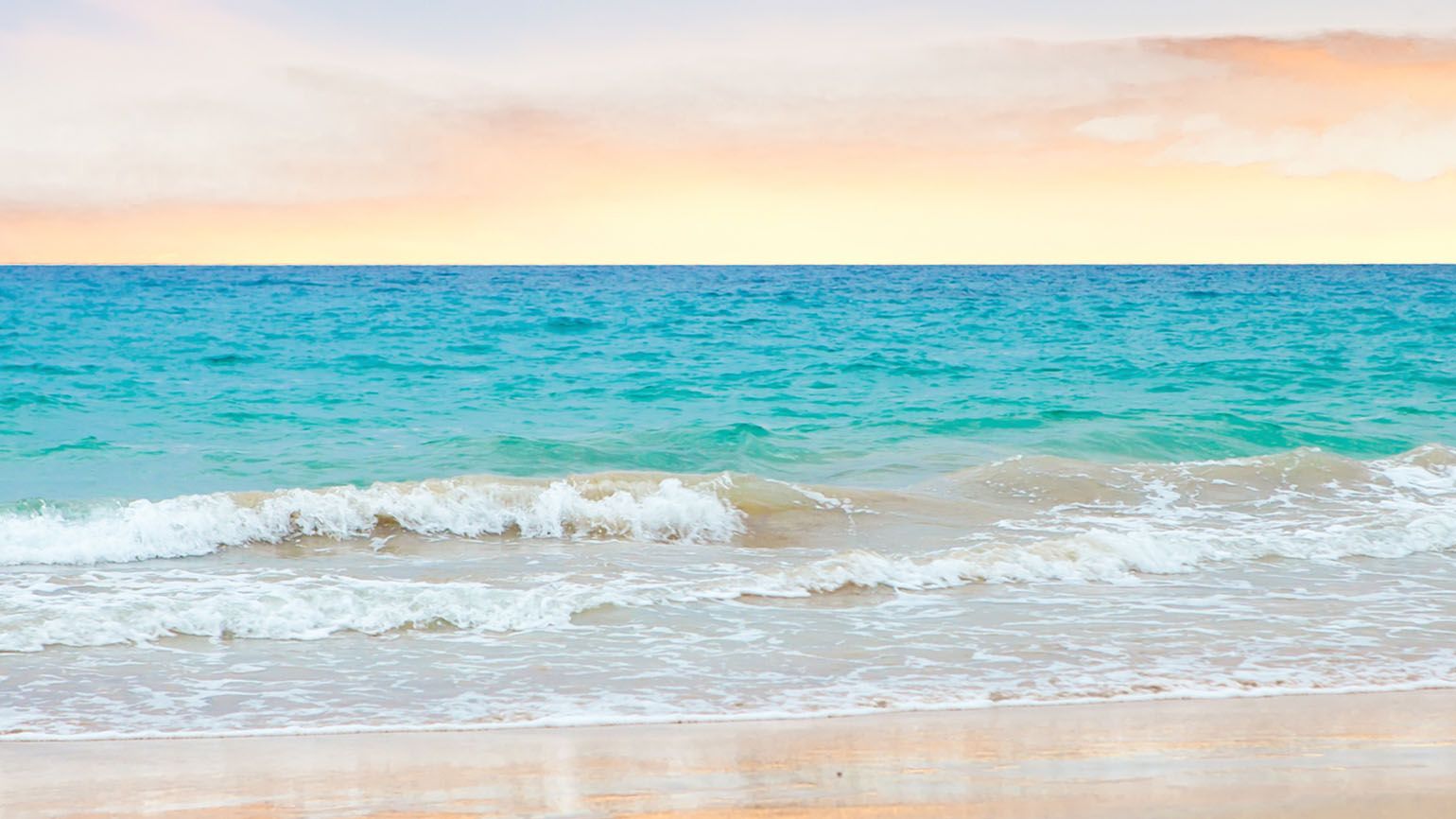 Waves crashing on a beach; Getty Images