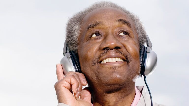 Senior man wearing headphones