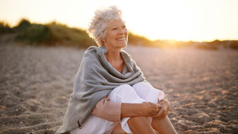 A contented woman on a beach