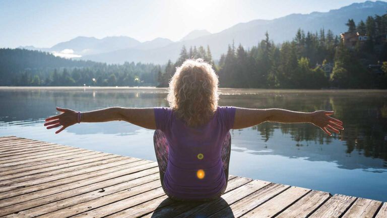 A woman in a mindful meditative position