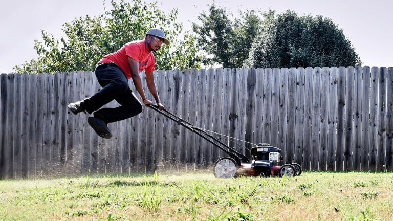 Rodney Smith, Jr., founder of Raising Men Lawn Care Service; photo by Ron Pollard