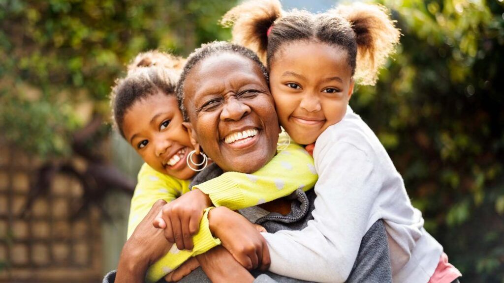 Grandmother and her grandchildren; Getty Images