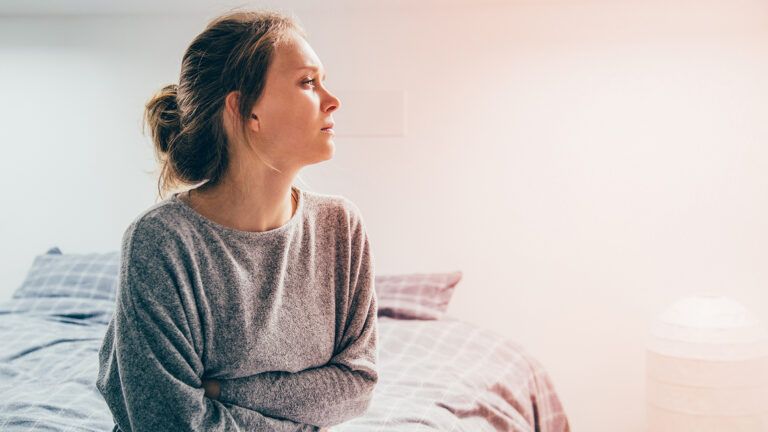 A weary and worried woman