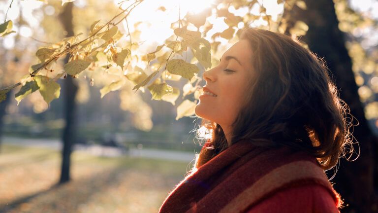 Smiling woman enjoying the outdoors