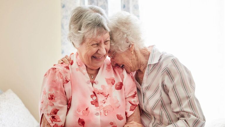 Senior women laughing