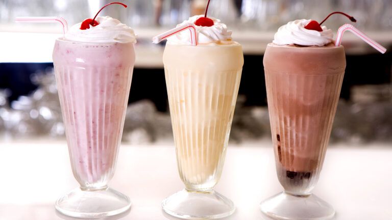 Stawberry, vanilla and chocolate milkshakes