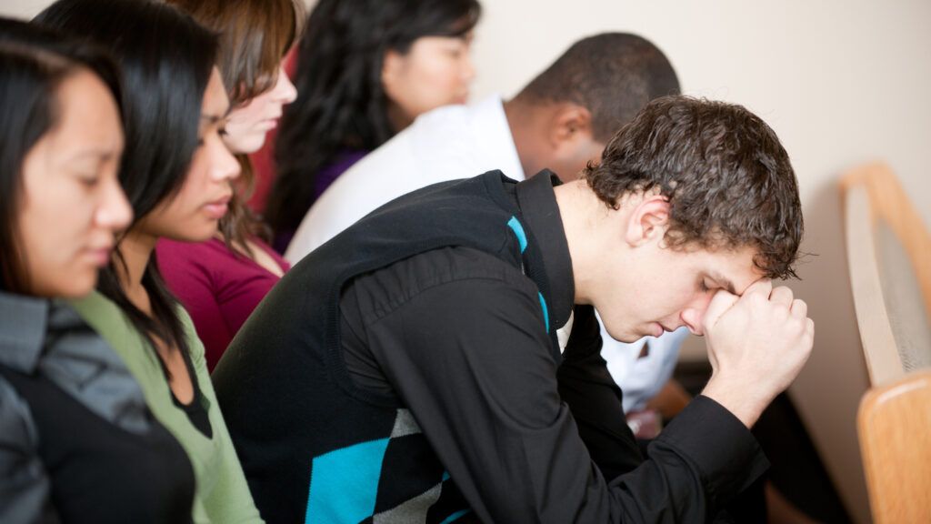 Church congregation praying