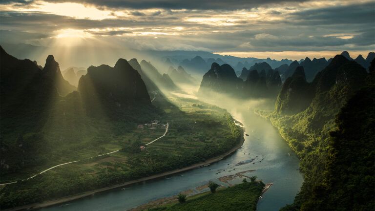 Sunbeams shining over mountains