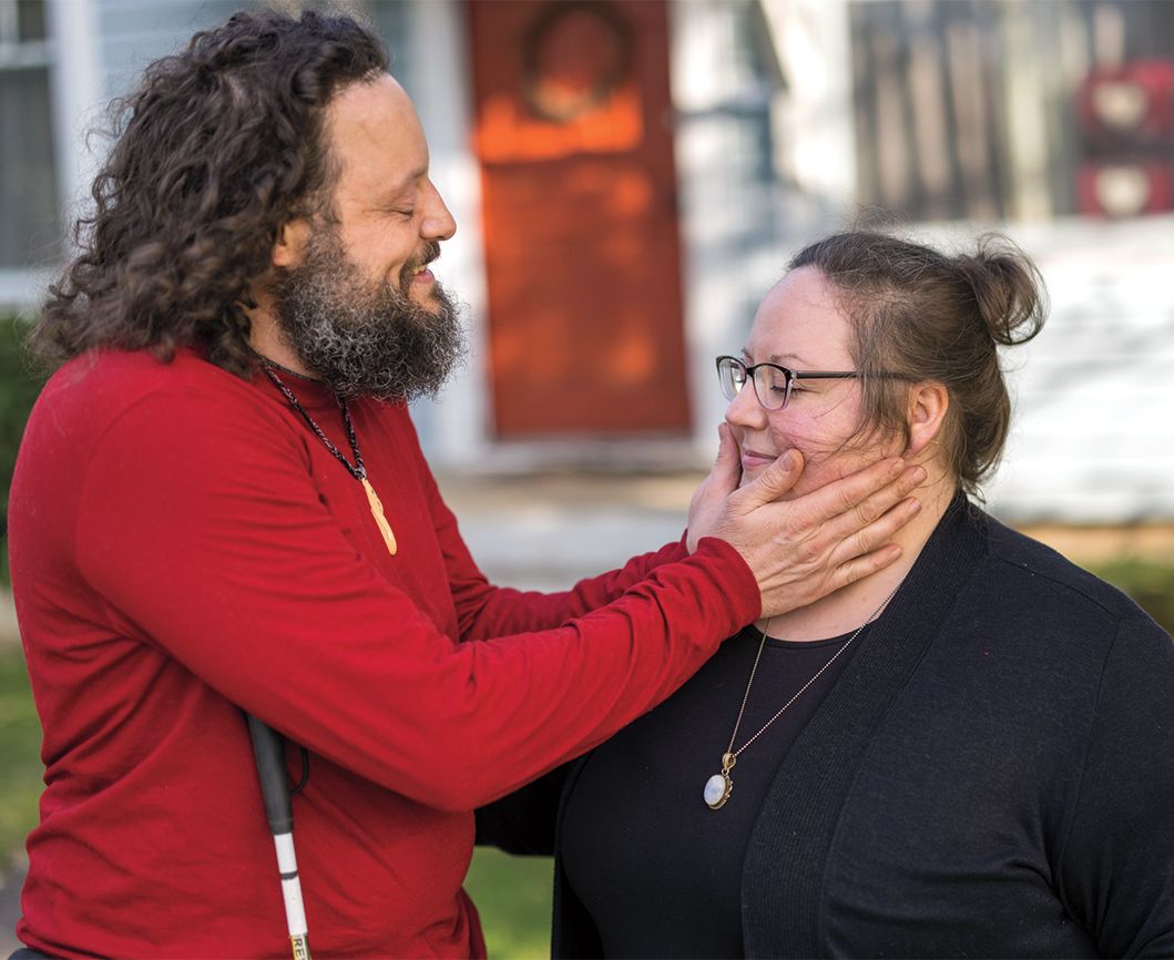 John touches Anni's face; photograph by Randy Boverman