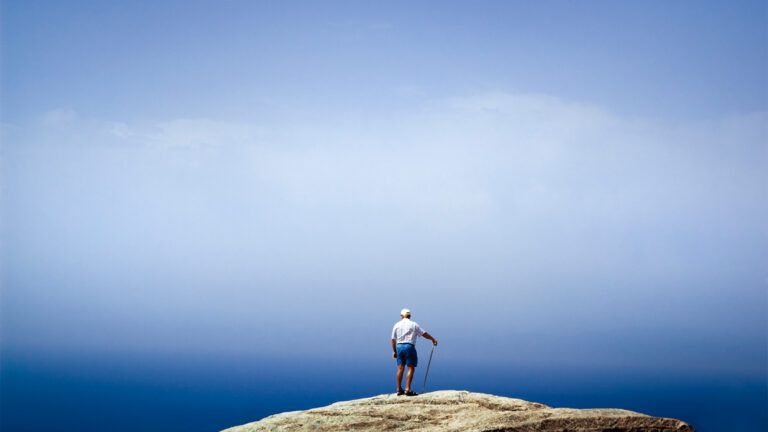 Man standing on a large rock