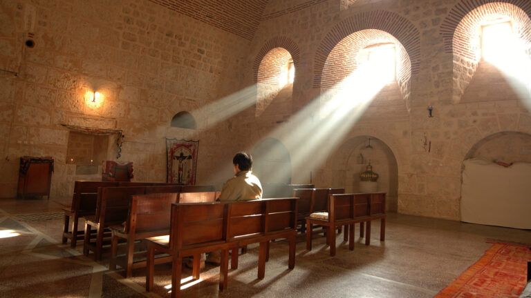 A man prays in church