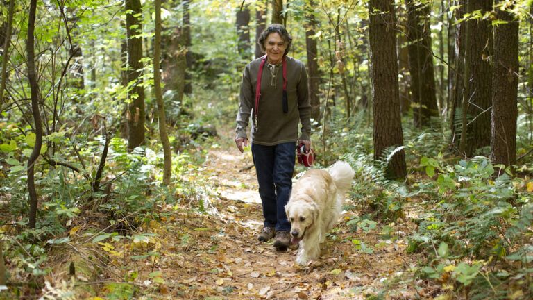 Edward and Gracie walking in the woods as a way to celebrate lent without church