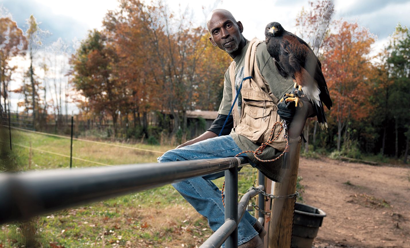 Rodney and one of his birds; photo by James Kegley