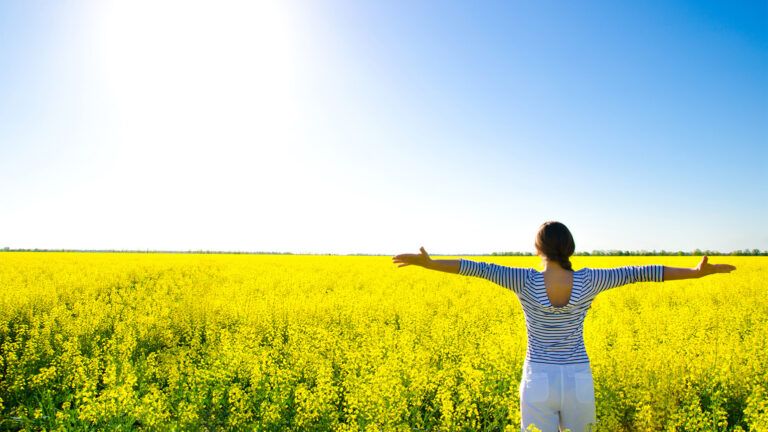 Woman in a field of flowers