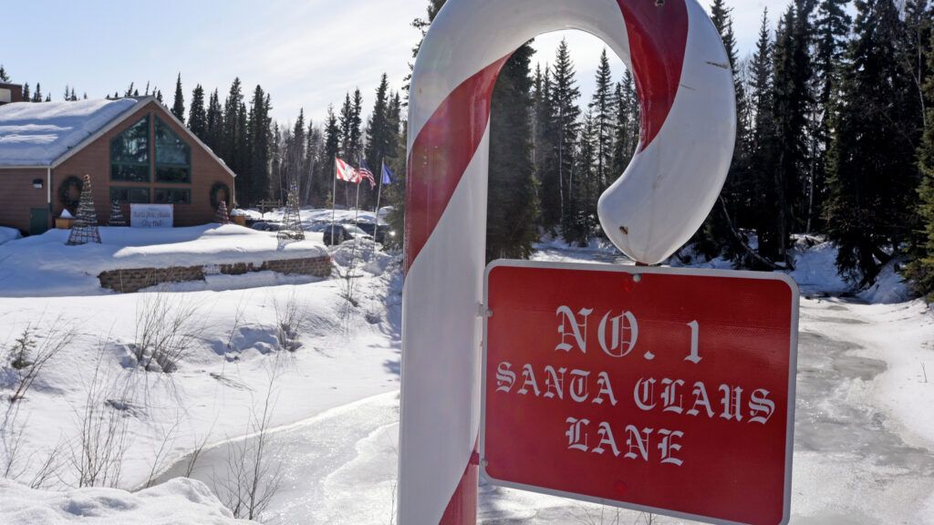 A candy cane sign for number 1 Santa Claus Lane in the real North Pole