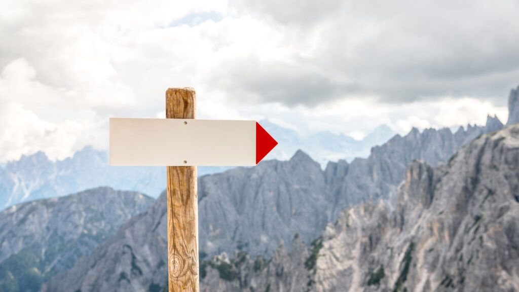 A guide post in the mountains.