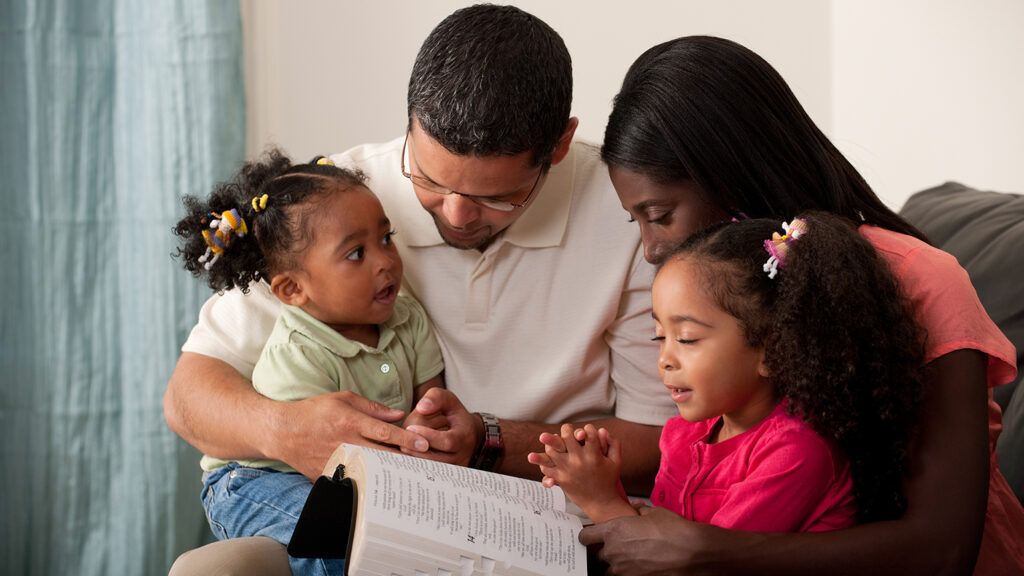 A family prays together