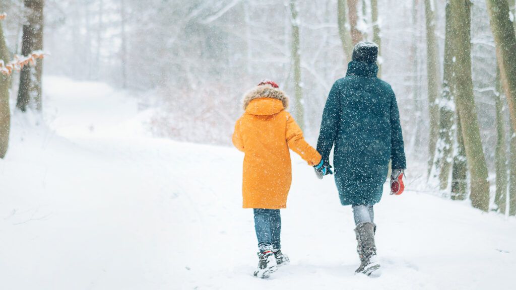 A family bonds with snow day activities